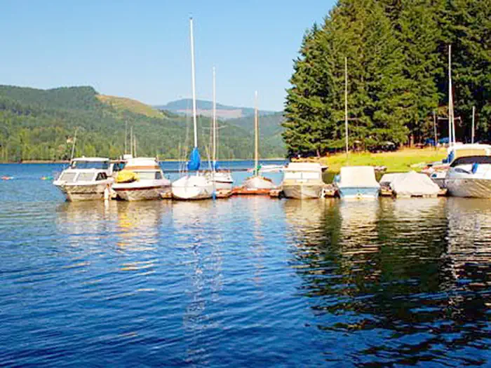 Boats docked on the lake