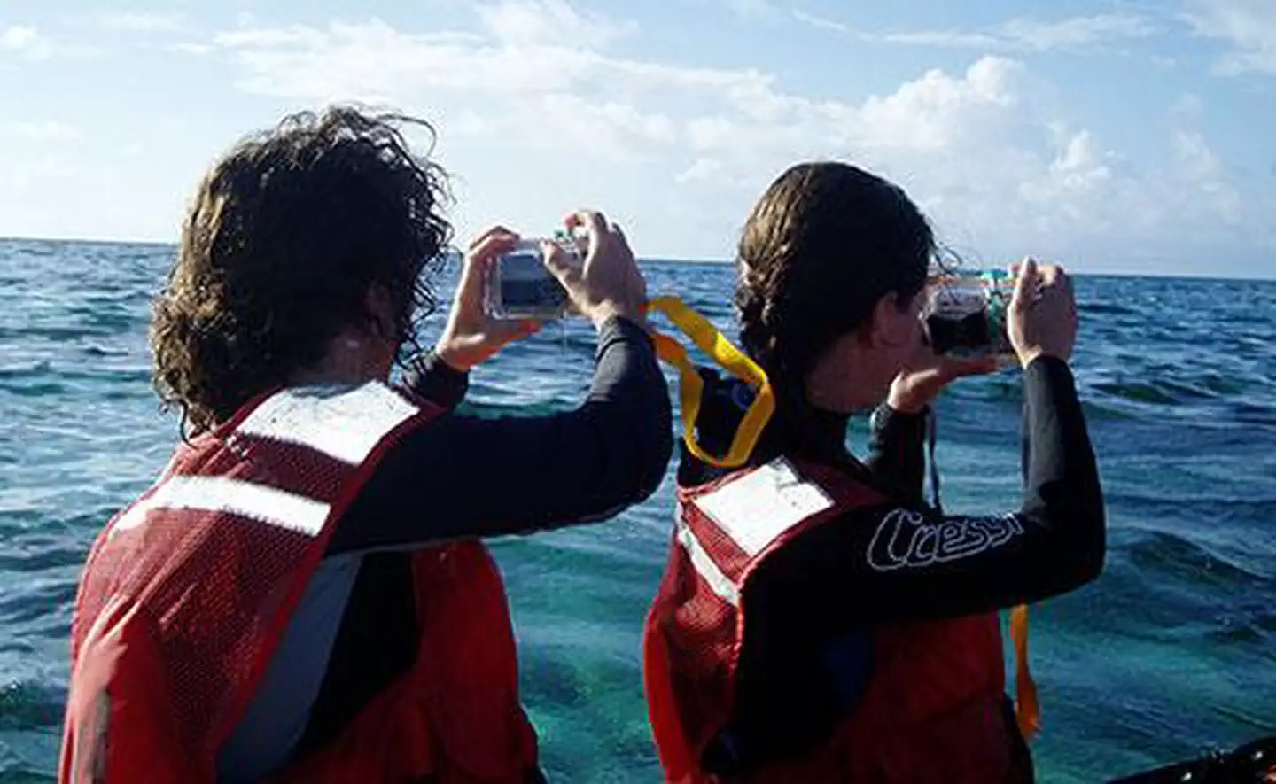 Taking photos from a skiff at Kure Atoll
